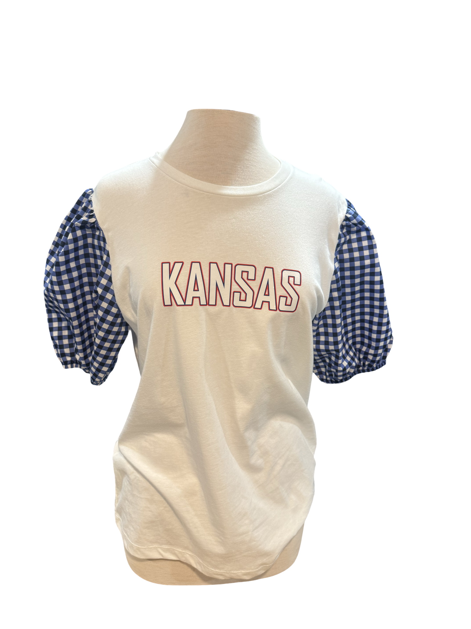 Rock Chalk, but make it cute.

Our Kansas Jayhawks Blue Gingham Puff Tee features a classic white base with bold Kansas lettering and the sweetest blue gingham puff sleeves for the perfect feminine game day look. Flattering, comfortable, and full of Jayhawk pride, it’s perfect for Allen Fieldhouse, campus days, and cheering on Kansas in style.

Made for the girls who bring the puff to game day.